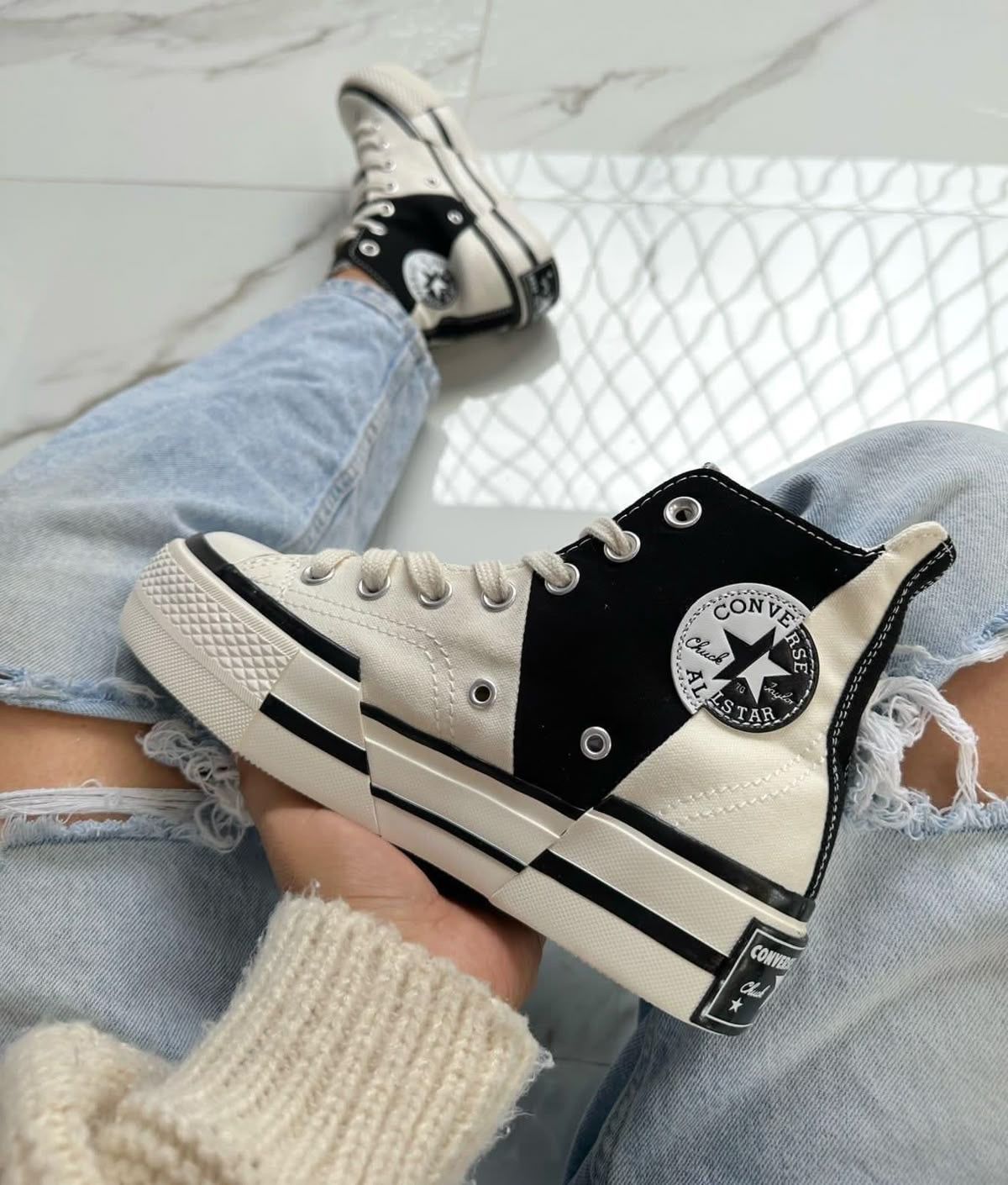 This item is a pair of Converse Chuck 70 Plus high-top